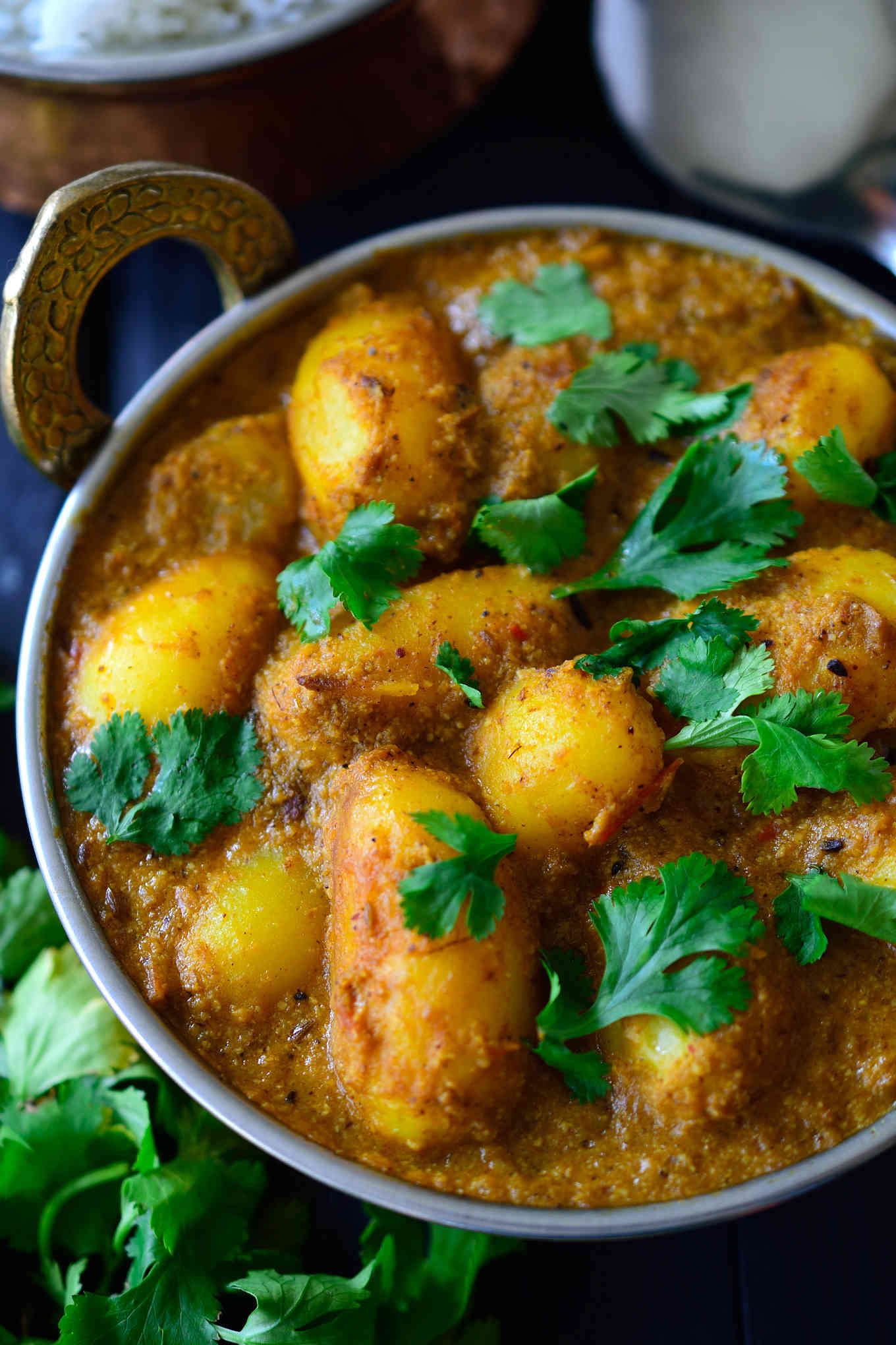 This spicy vegan potato curry is full on with flavour and easy to make with pantry staples. Fried potatoes are simmered in a spicy and savory tomato-cashew sauce infused with delicious, aromatic Indian spices. You''l be surprised by how tasty the humble potato can be! 