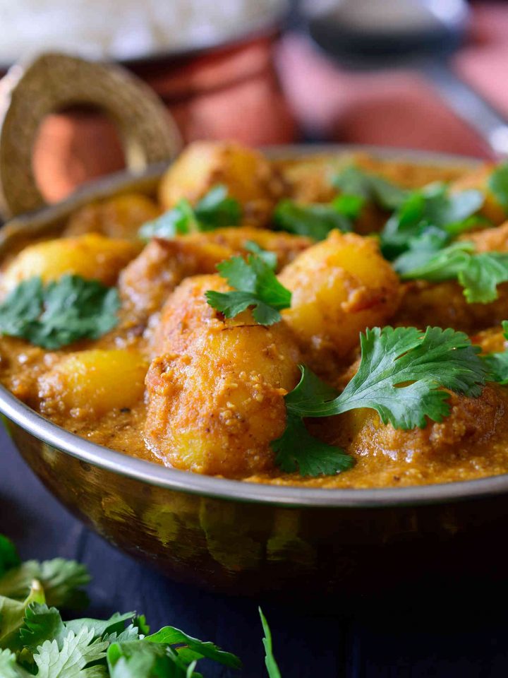 This spicy vegan potato curry is full on with flavour and easy to make with pantry staples. Fried potatoes are simmered in a spicy and savory tomato-cashew sauce infused with delicious, aromatic Indian spices. You''l be surprised by how tasty the humble potato can be!