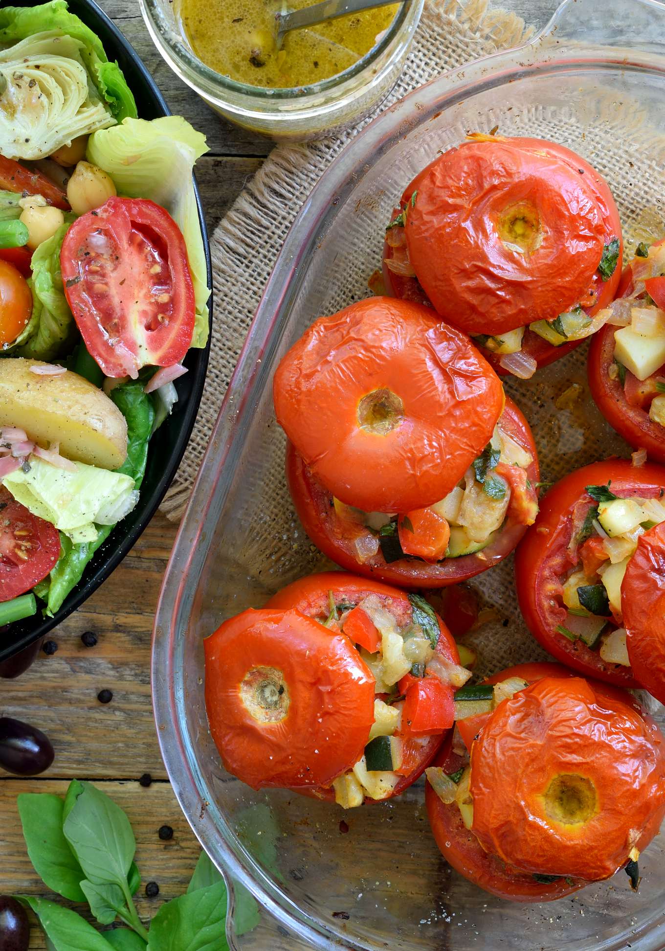 These easy vegetarian stuffed tomatoes require few ingredients and are so delicious in the summertime when tomatoes, peppers and zucchini are at their peak. This stuffed tomato recipe is great to prepare as a vegetarian or vegan side dish, starter or main dish and make a filling and delicious full meal when accompanied by a vegan Niçoise salad.