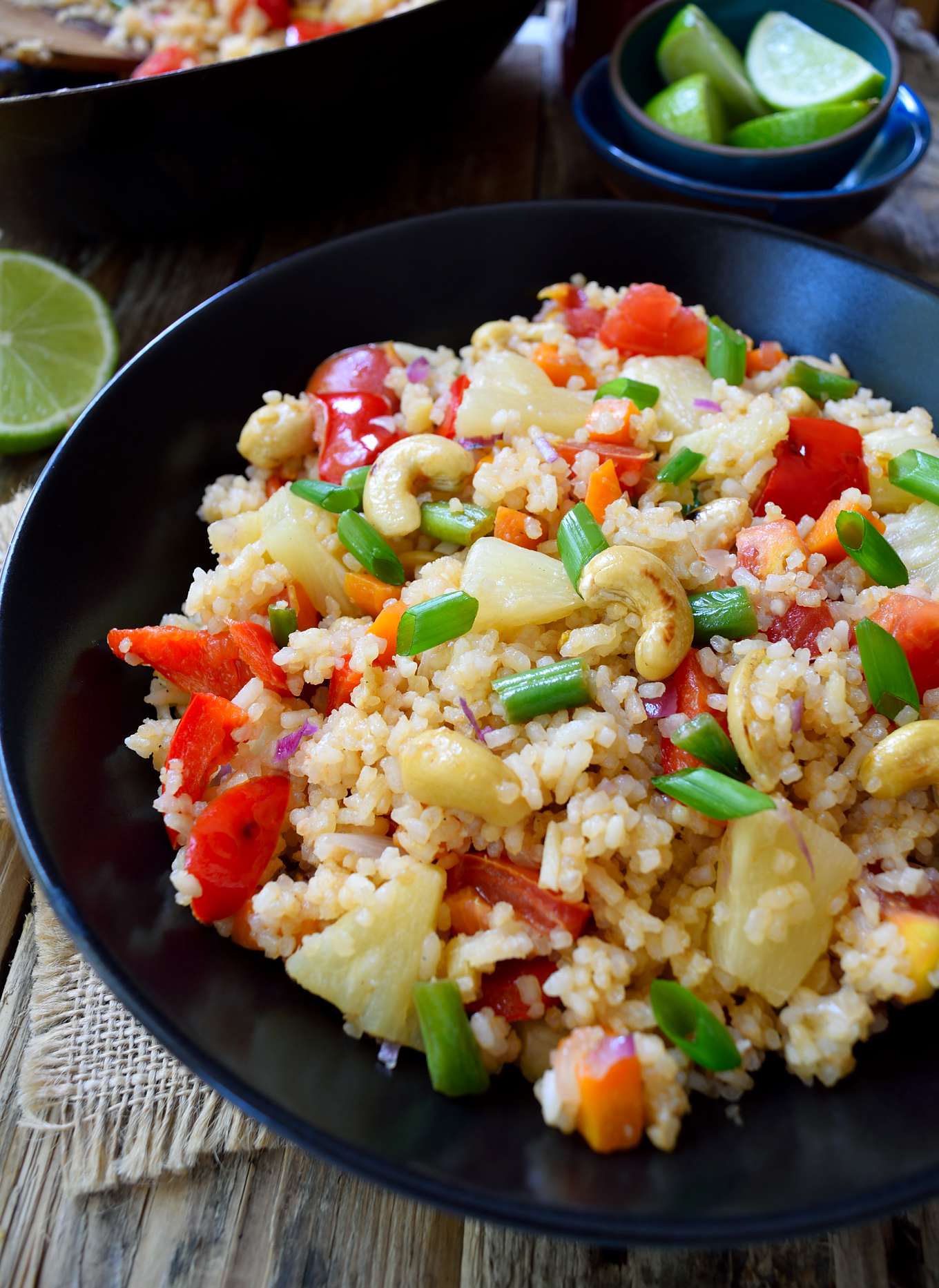 You know what they say: eat the rainbow, and this colorful vegan fried rice recipe will help you do just that! I love recipes that can be thrown together in a matter of minutes for a quick and easy weeknight dinner and fried rice is a definite go-to for those days when you have neither the time nor inclination to cook.