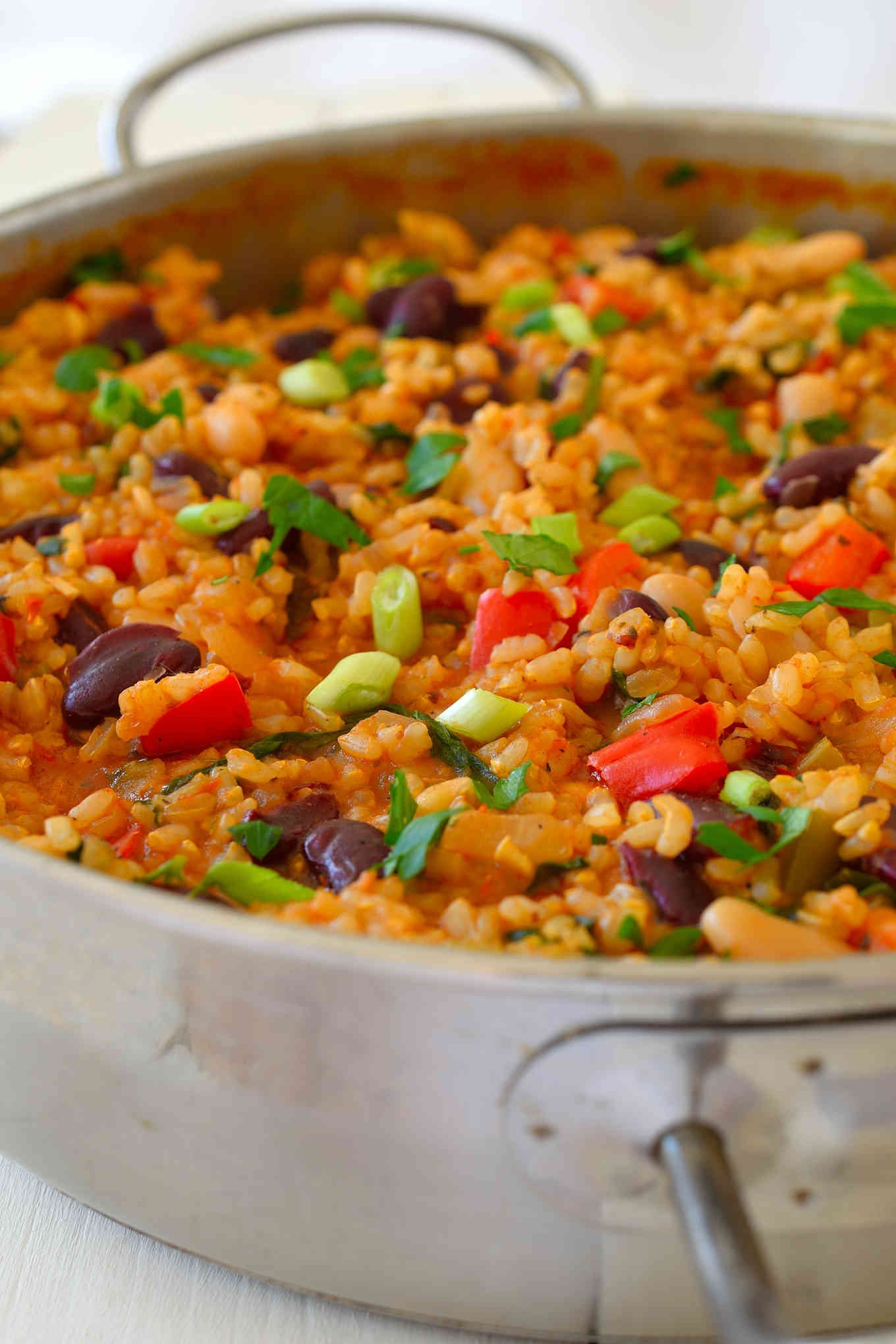 This vegan jambalaya recipe is super easy to make with basic pantry staples. Tomato-y rice flavoured with loads of herbs and spices and bulked up with celery, peppers and a selection of mixed beans make a hearty, warming and filling quick weeknight lunch or dinner.