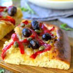 Pissaladière is a French onion pizza that you can serve as an appetizer or main dish and is great both hot and cold. The secret is the slow-cooked onions, gently fried until they’re soft, sweet and caramelized. In order to make this a vegan pissaladière, I’ve replaced the traditional anchovies with strips of roasted red pepper and capers.