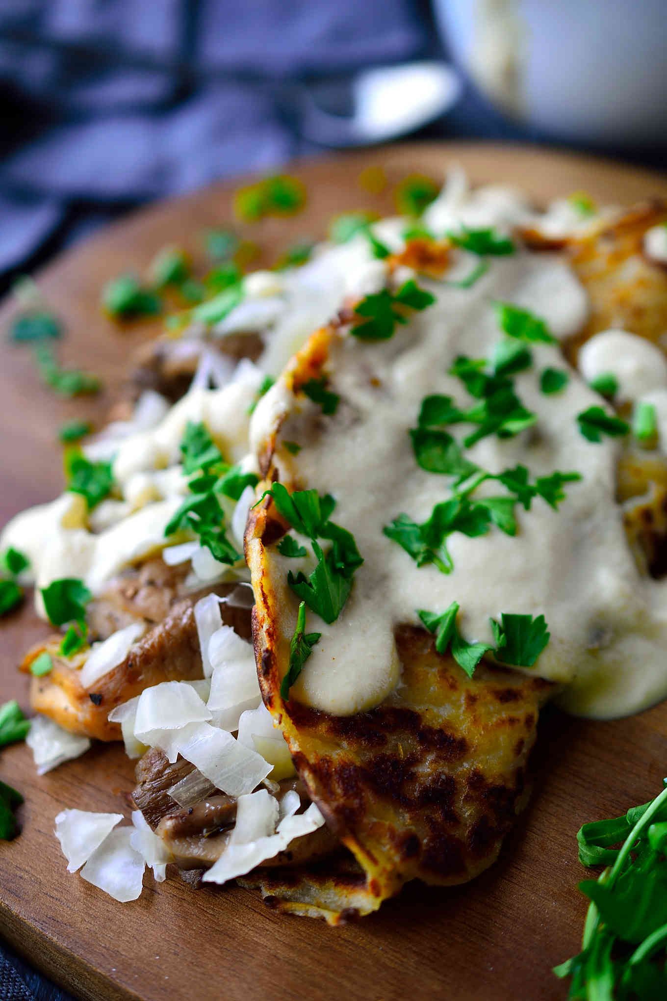 These vegan potato pancakes are based on a traditional Irish boxty recipe and stuffed with sautéed mushrooms and sauerkraut and topped with a creamy vegan mustard sauce. They’re incredibly easy to make and great served for breakfast, lunch or dinner! 
